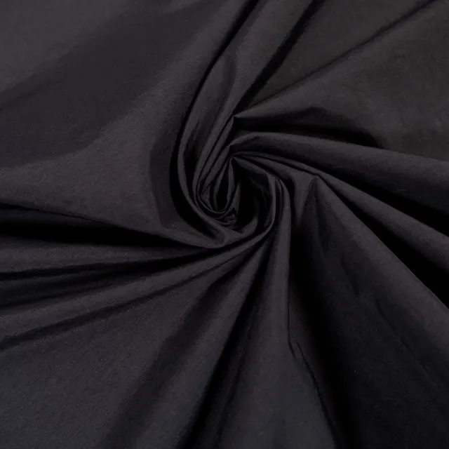 ikat-e-tissus-canvas-d-perlant-tissu-noir-145-cm image 1