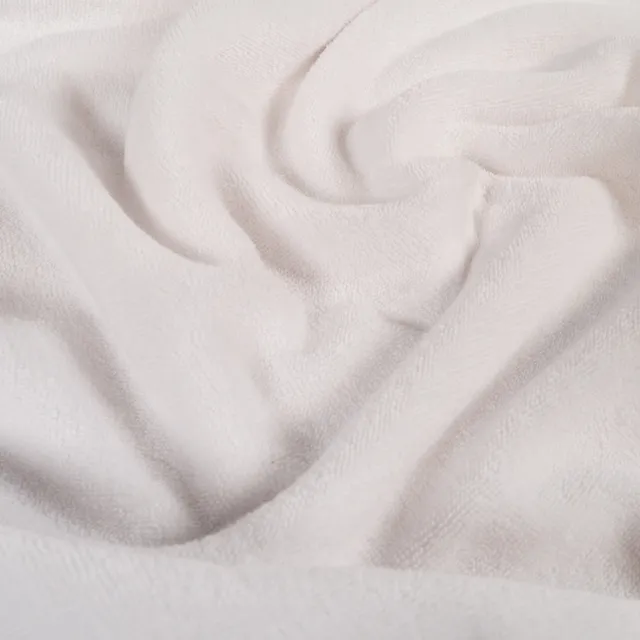 ikat-e-ponge-maille-bouclette-tissu-blanc-neige-extensible image 1