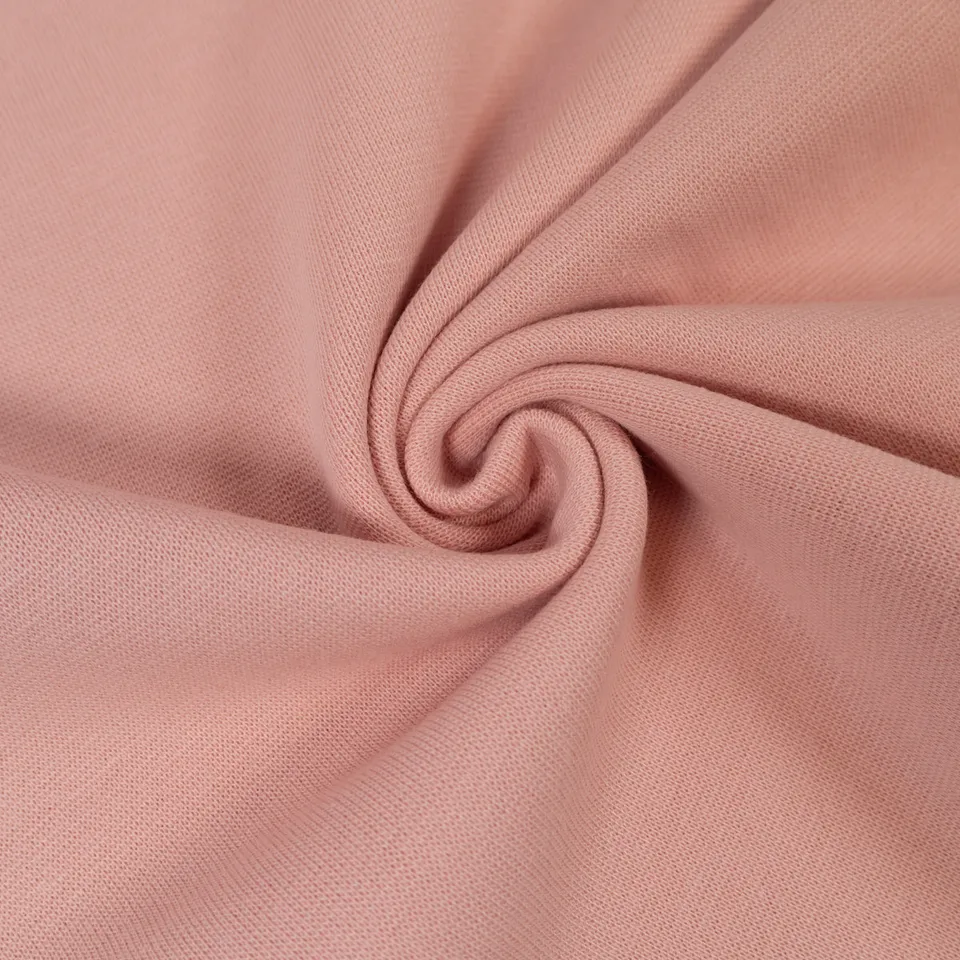 ikat-e-bord-c-te-rose-blush-tissu-uni-extensible image 1