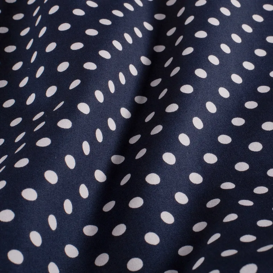 ikat-e-tissus-popeline-coton-pois-blanc-marine image 1