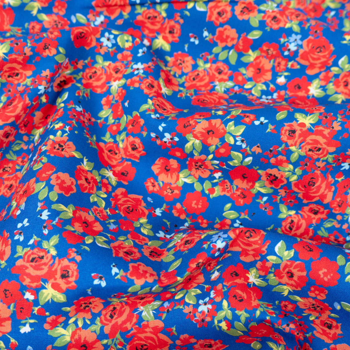 ikat-e-tissus-happy-flowers-tissu-popeline-bleu-roi image 1