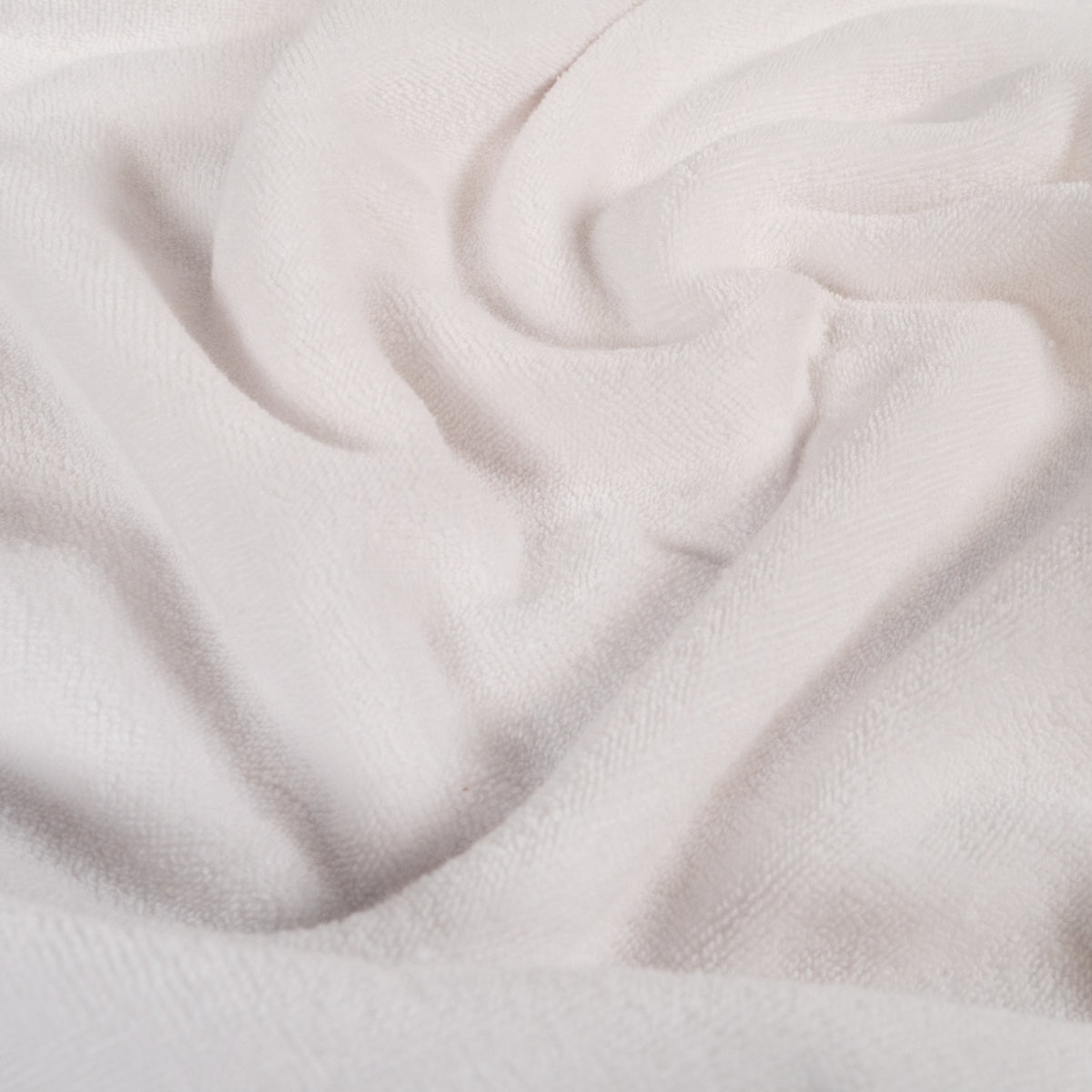 ikat-e-ponge-maille-bouclette-tissu-blanc-neige-extensible image 1