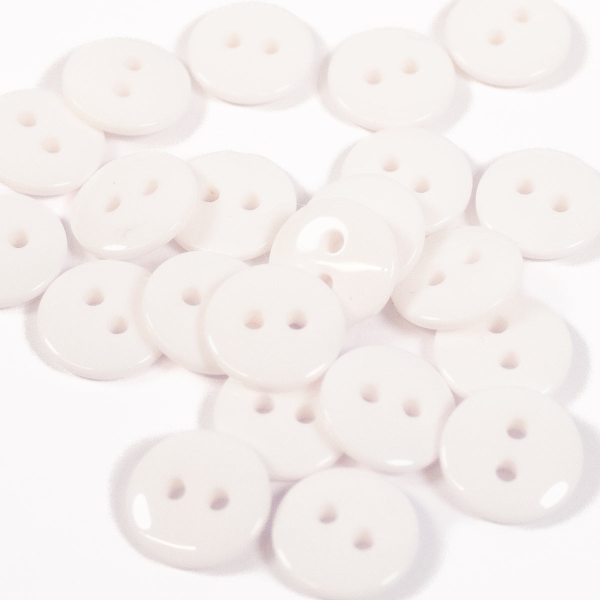 ikat-e-mercerie-bouton-brillant-2-trous-blanc-12-mm image 1